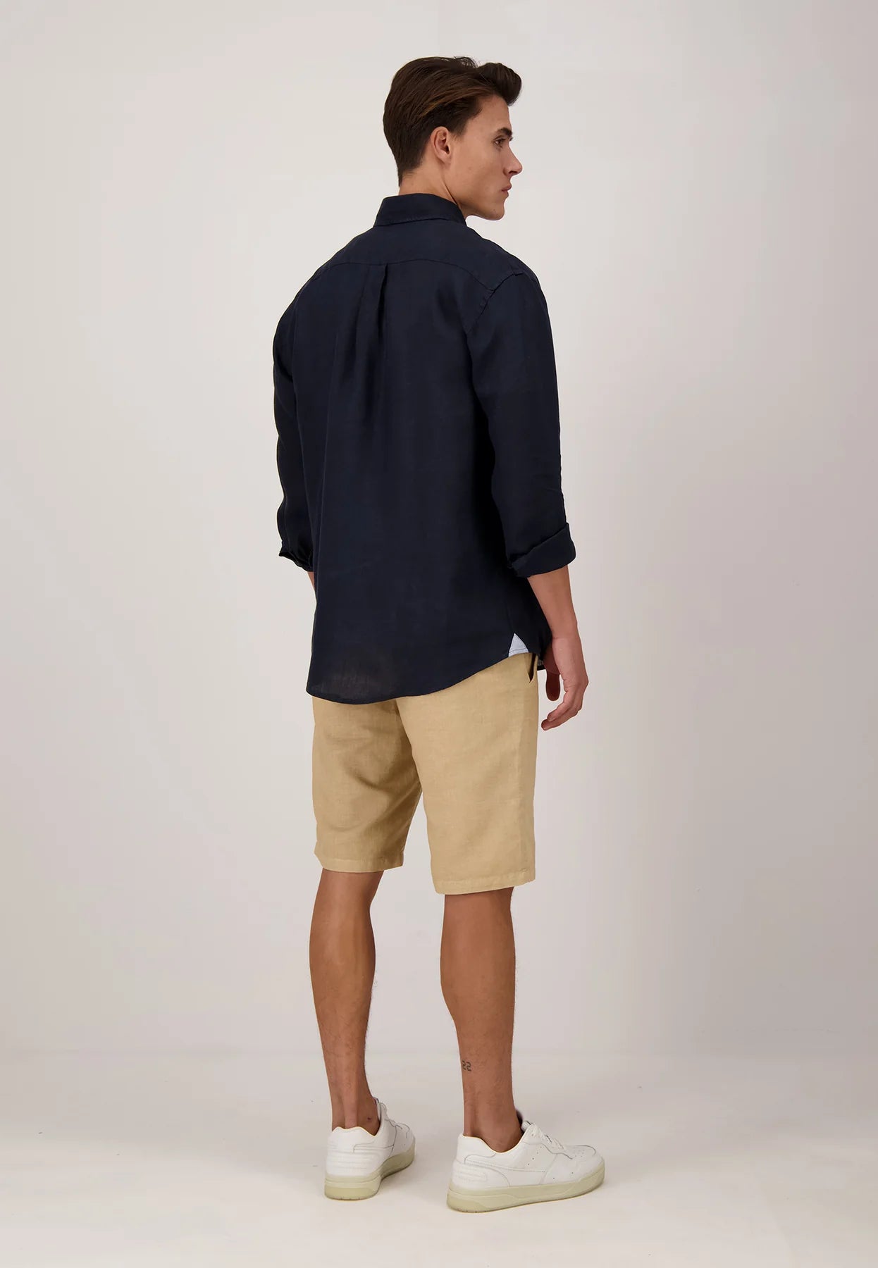 A Model wearing Fynch-Hatton Pure Linen Button Down Collar Long Sleeve Shirt Navy Back