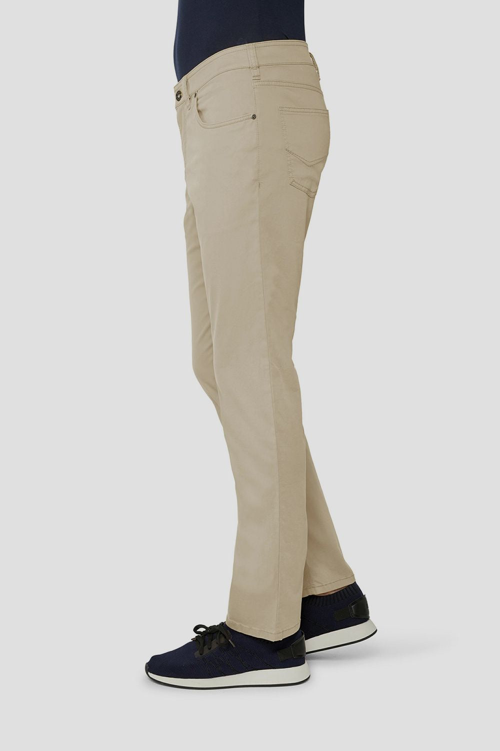 a model wearing Gardeur Cotton Flex Trousers Beige side view